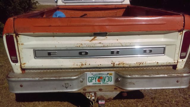 1974 orange/white Ford F-250 super cab