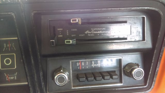 1974 orange/white Ford F-250 super cab