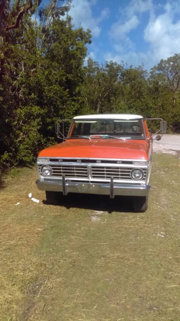 1974 orange/white Ford F-250 super cab