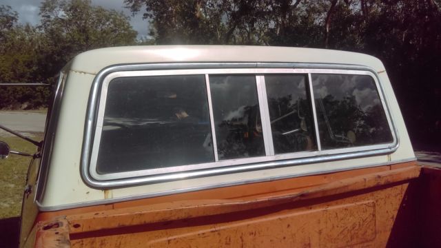 1974 orange/white Ford F-250 super cab