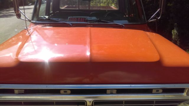 1974 orange/white Ford F-250 super cab