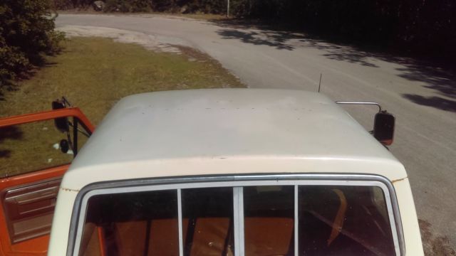 1974 orange/white Ford F-250 super cab