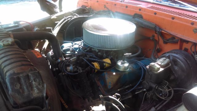 1974 orange/white Ford F-250 super cab