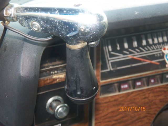 1974 Red with woodgrain Ford Country Squire Wagon