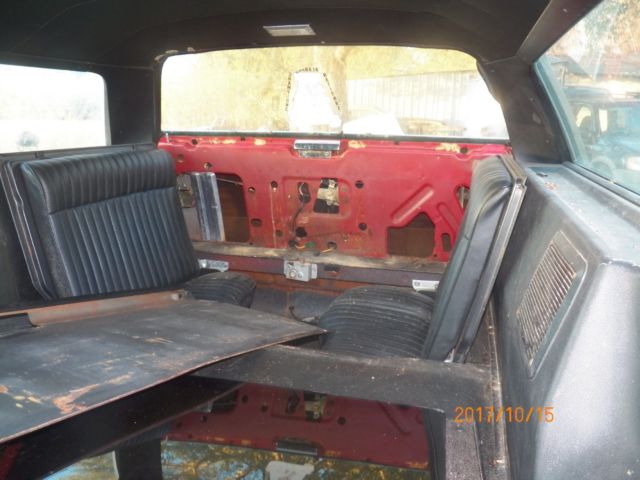 1974 Red with woodgrain Ford Country Squire Wagon