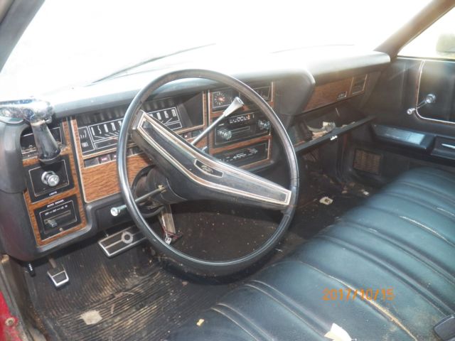 1974 Red with woodgrain Ford Country Squire Wagon