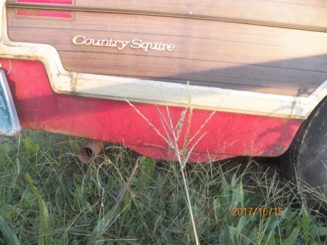 1974 Red with woodgrain Ford Country Squire Wagon