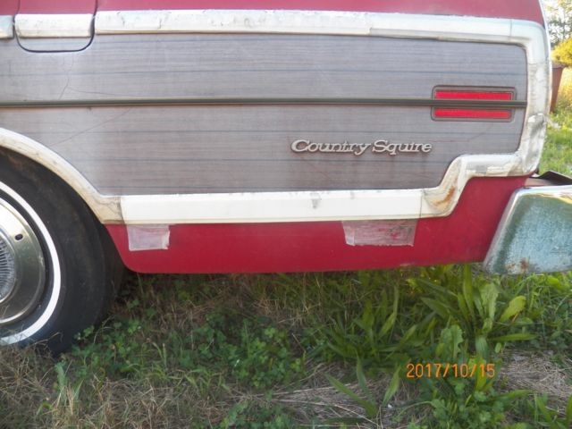 1974 Red with woodgrain Ford Country Squire Wagon