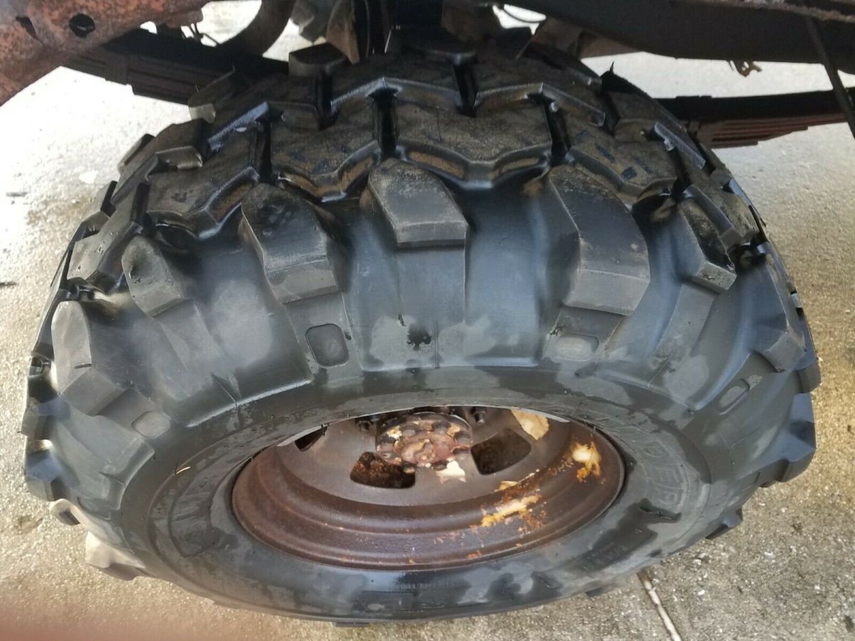 1974 Blue Ford F-250 pickup truck w capped bed