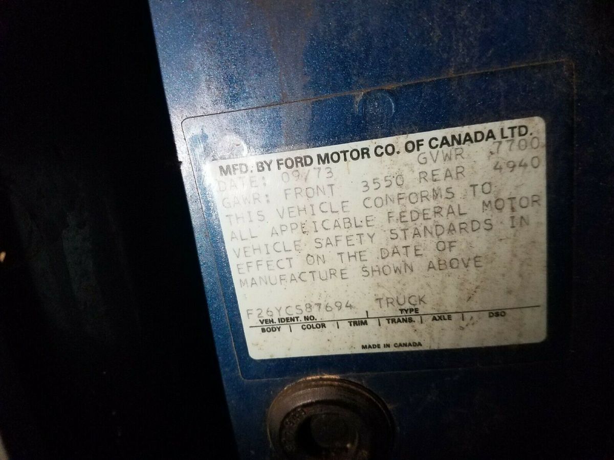 1974 Blue Ford F-250 pickup truck w capped bed