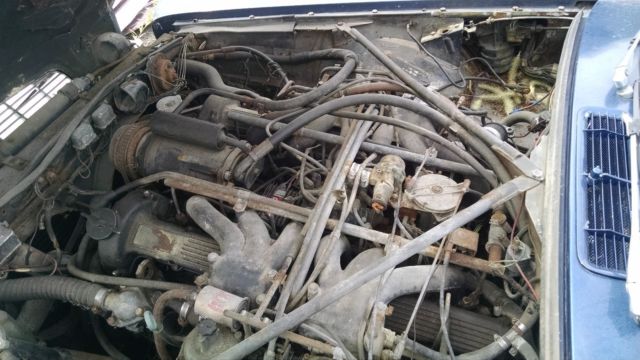 1974 blue Jaguar XK Sedan