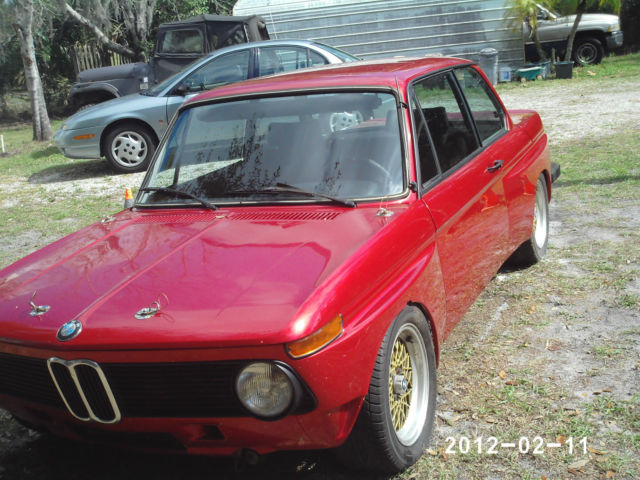 1974 red BMW 2002 2dr