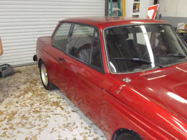 1974 red BMW 2002 2dr