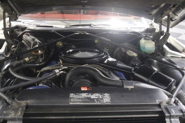 1975 White Cadillac Coupe Deville