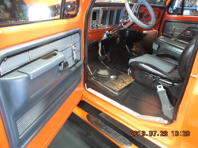 1975 Orange Ford F-100 Extended Crew Cab Pickup