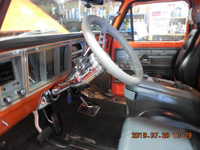 1975 Orange Ford F-100 Extended Crew Cab Pickup