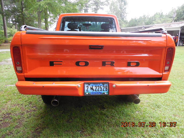 1975 Orange Ford F-100 Extended Crew Cab Pickup
