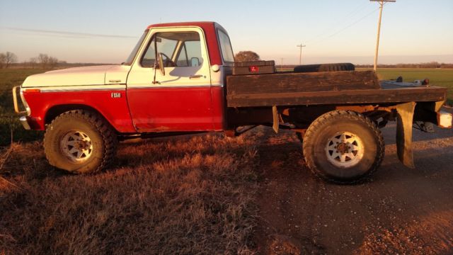 1975 red/white Ford F-250 truck
