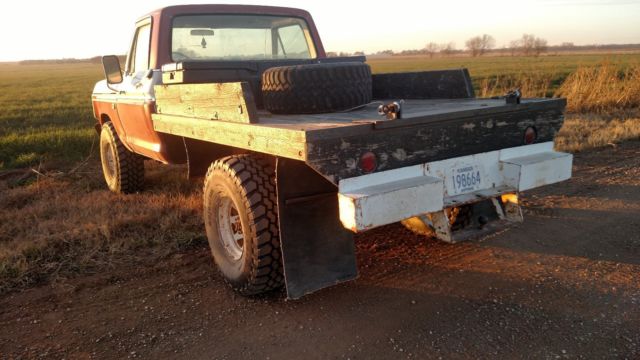 1975 red/white Ford F-250 truck
