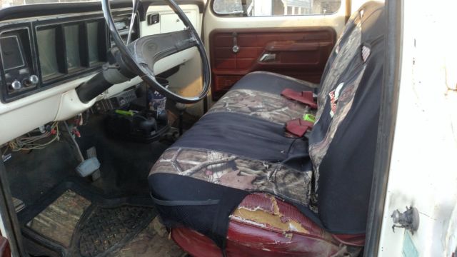 1975 red/white Ford F-250 truck