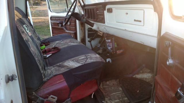 1975 red/white Ford F-250 truck