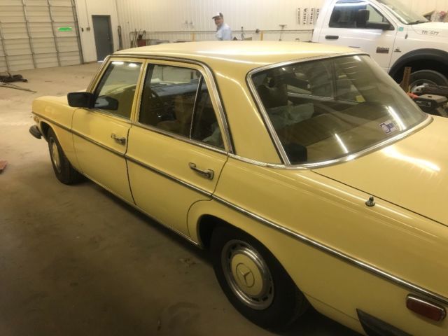 1975 Yellow Mercedes-Benz 200-Series Sedan