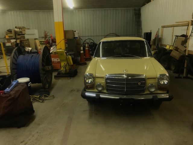 1975 Yellow Mercedes-Benz 200-Series Sedan