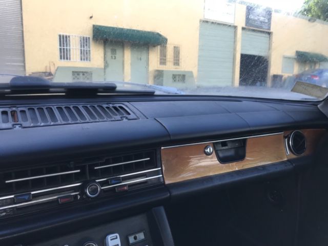 1975 Green Mercedes-Benz 200-Series Sedan