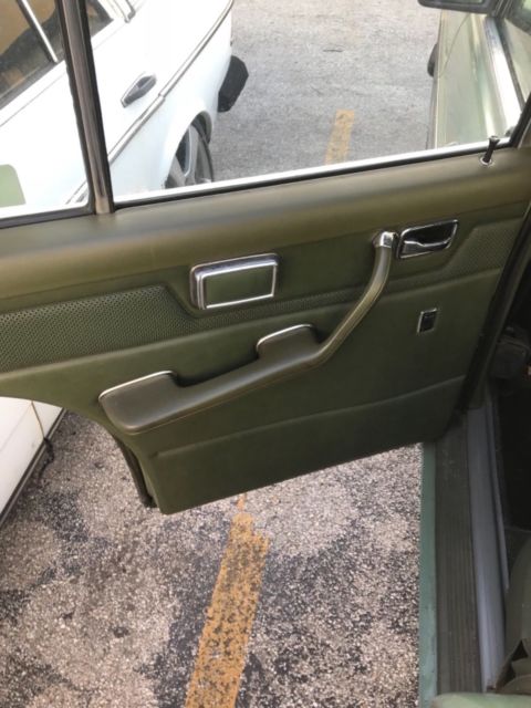 1975 Green Mercedes-Benz 200-Series Sedan