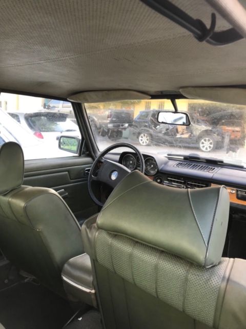 1975 Green Mercedes-Benz 200-Series Sedan