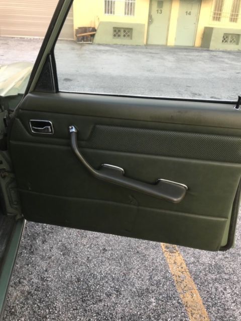 1975 Green Mercedes-Benz 200-Series Sedan