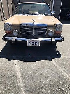 1975 Tan Mercedes-Benz 200-Series Sedan