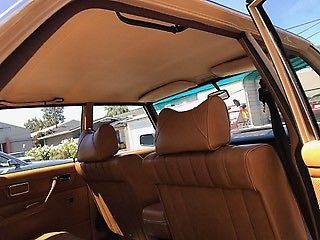 1975 Tan Mercedes-Benz 200-Series Sedan