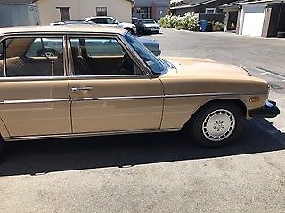 1975 Tan Mercedes-Benz 200-Series Sedan