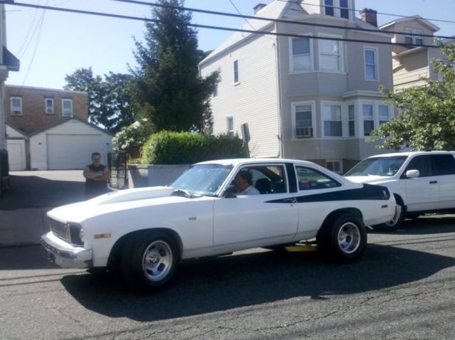 1975 black Chevrolet Nova Coupe