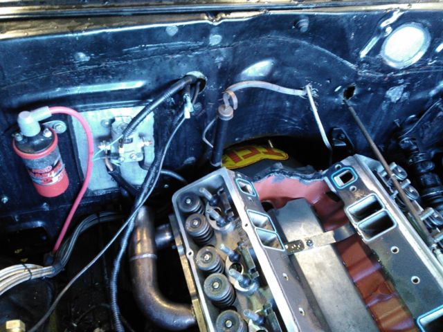 1975 black Chevrolet Nova Coupe