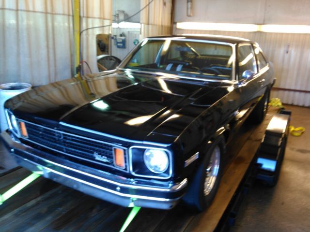1975 black Chevrolet Nova Coupe