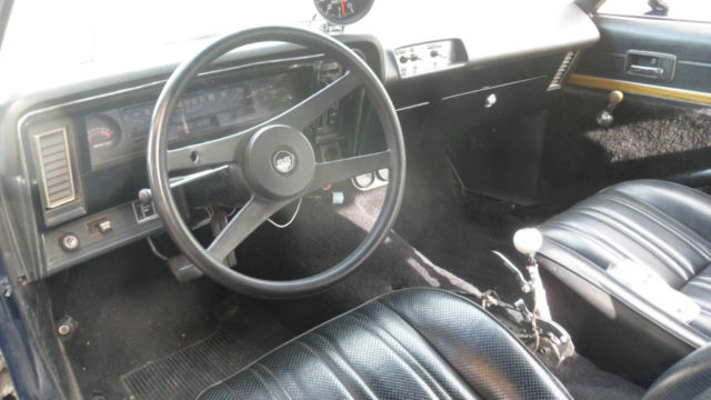 1975 black Chevrolet Nova Coupe