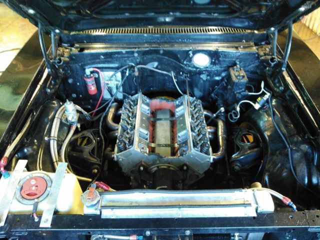 1975 black Chevrolet Nova Coupe