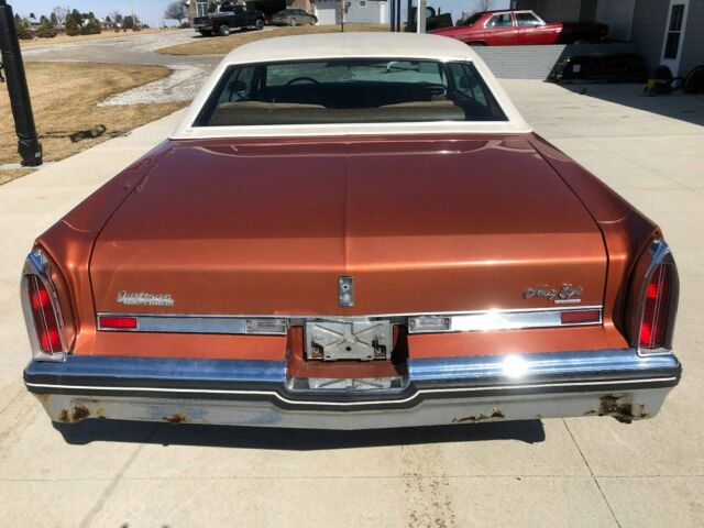 1975 Orange Oldsmobile Ninety-Eight Sedan