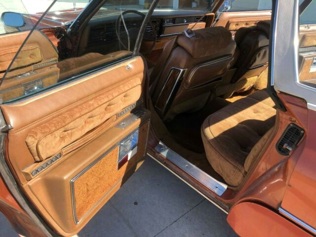 1975 Orange Oldsmobile Ninety-Eight Sedan