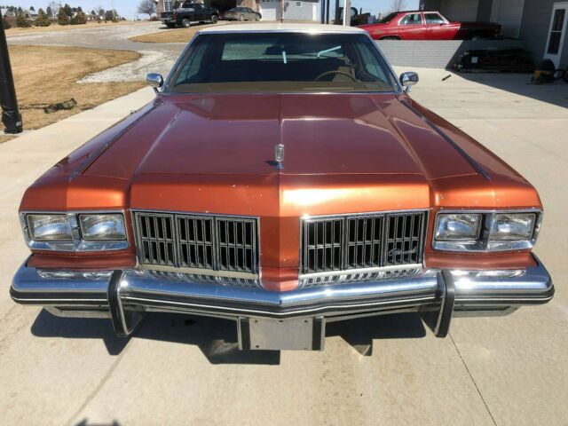 1975 Orange Oldsmobile Ninety-Eight Sedan
