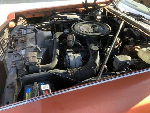 1975 Orange Oldsmobile Ninety-Eight Sedan