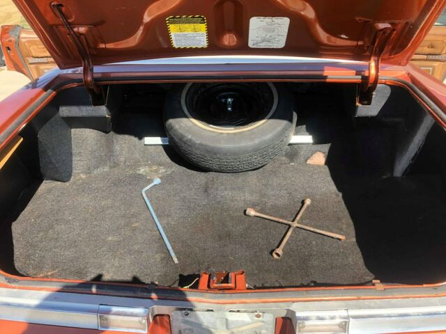 1975 Orange Oldsmobile Ninety-Eight Sedan