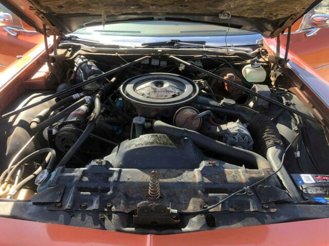 1975 Orange Oldsmobile Ninety-Eight Sedan