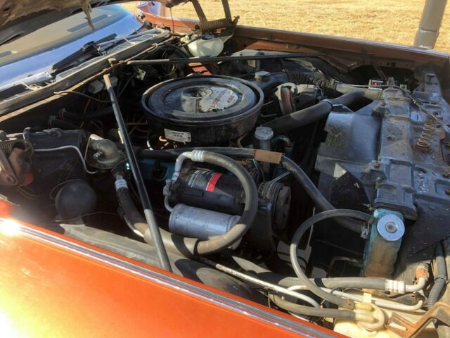 1975 Orange Oldsmobile Ninety-Eight Sedan