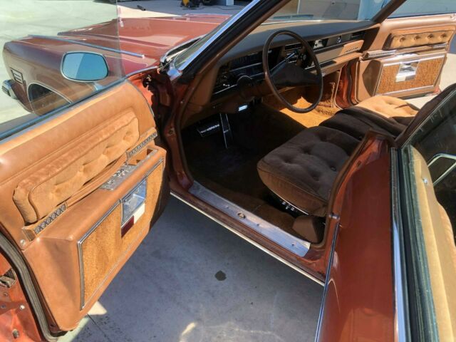 1975 Orange Oldsmobile Ninety-Eight Sedan