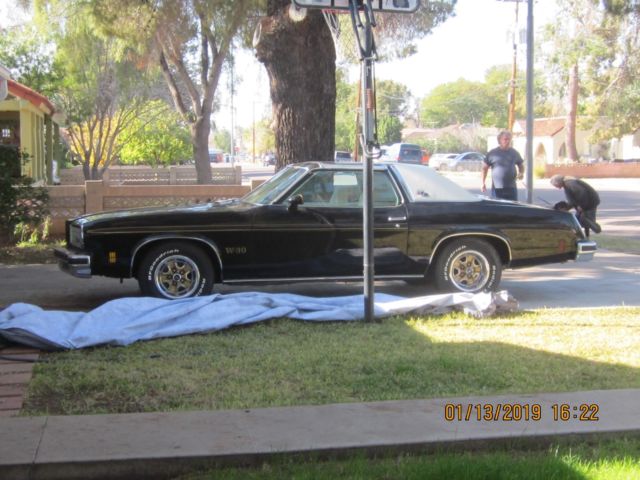 1975 Black Oldsmobile Cutlass