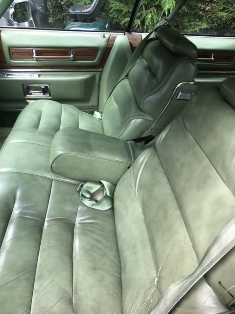 1975 Gray/green Cadillac DeVille Sedan