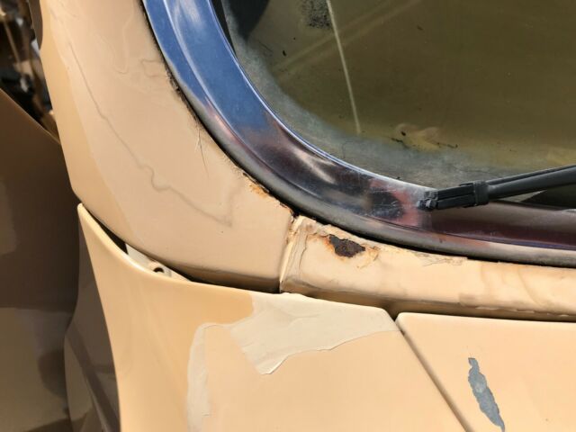 1976 beige Ford E-Series Van